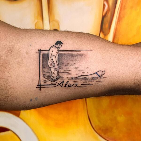 62 Beautiful Remembrance Tattoos for Dogs: A Heartfelt Tribute 12 Meaningful dog memorial tattoo on forearm showing man and dog silhouette with name Alex, black line art style