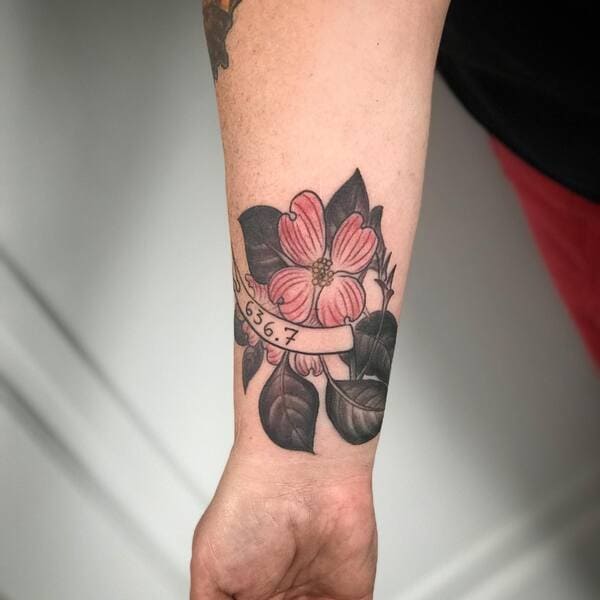 62 Beautiful Remembrance Tattoos for Dogs: A Heartfelt Tribute 50 Pink dogwood flower memorial tattoo with date banner on forearm
