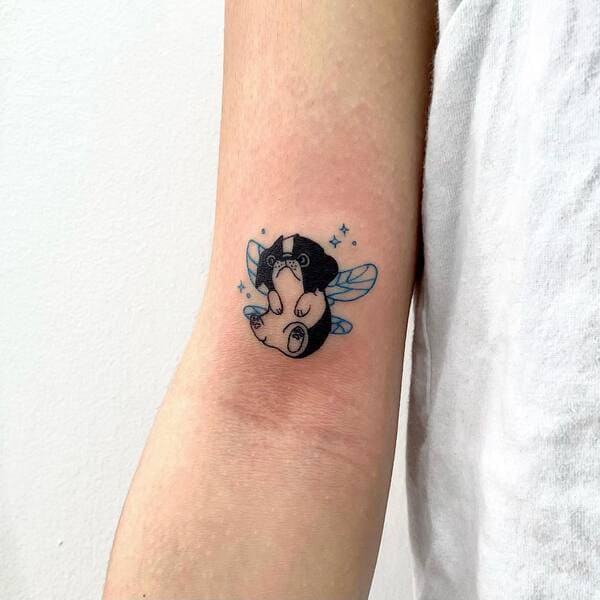 62 Beautiful Remembrance Tattoos for Dogs: A Heartfelt Tribute 4 Simple black paw print memorial tattoo on forearm