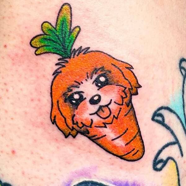 62 Beautiful Remembrance Tattoos for Dogs: A Heartfelt Tribute 3 Playful carrot and dog design tattoo in vibrant colors