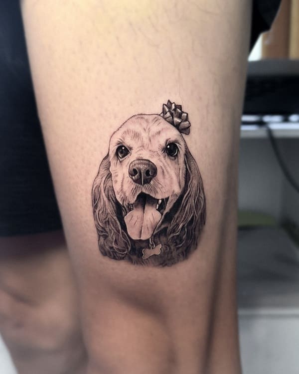 62 Beautiful Remembrance Tattoos for Dogs: A Heartfelt Tribute 45 Realistic black and grey Cocker Spaniel portrait memorial tattoo with bow crown